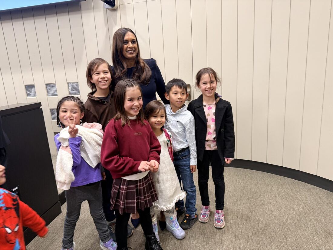 Pranita with local schoolchildren